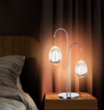 LED 2 light table lamp in polished chrome and clear glass finished