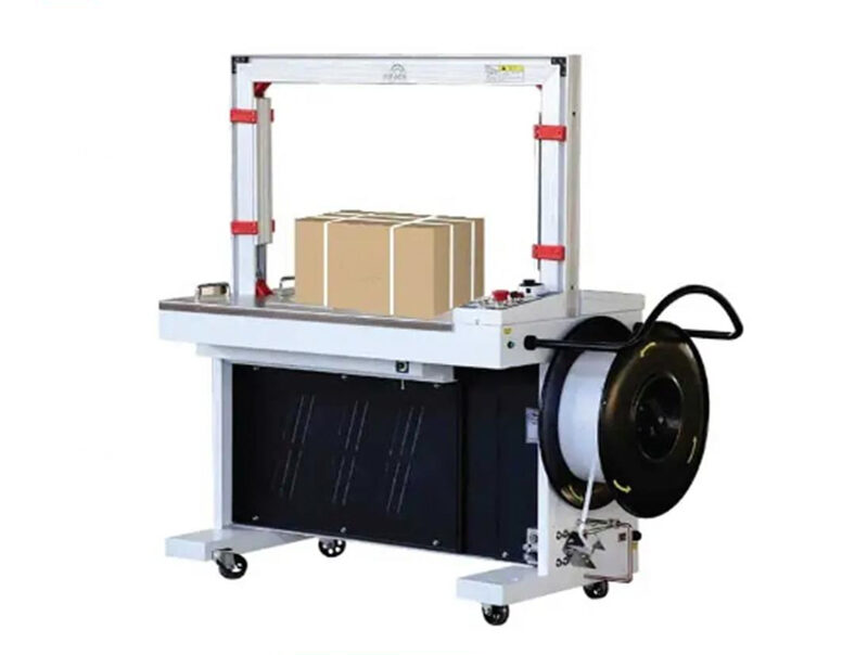 auto-strap2-e1725284329991.jpg Full Automatic Strapping Machine - Image 1